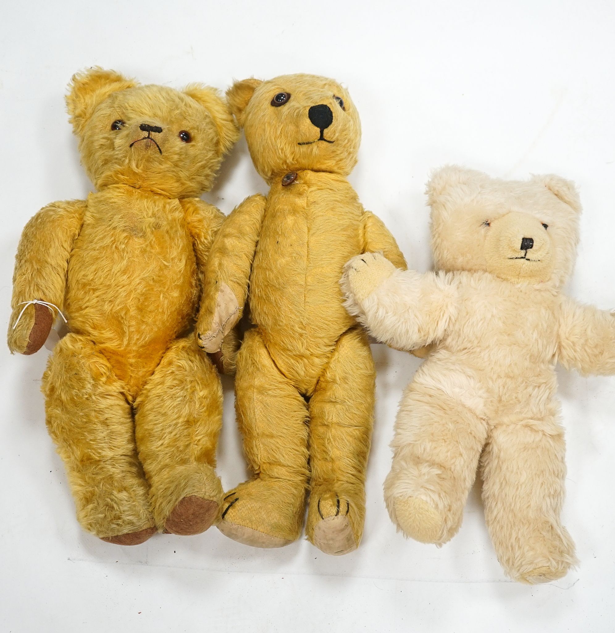 An Irish Bear with label, Erris Toys, 21in., with Pedigree, 22in. and a Wendy Boston, with label, 17in.